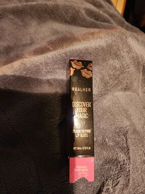 REALHER Discover Your Magic Black-to-Pink Lip Gloss